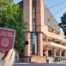 Tribunal de Turín con pasaporte italiano en primer plano